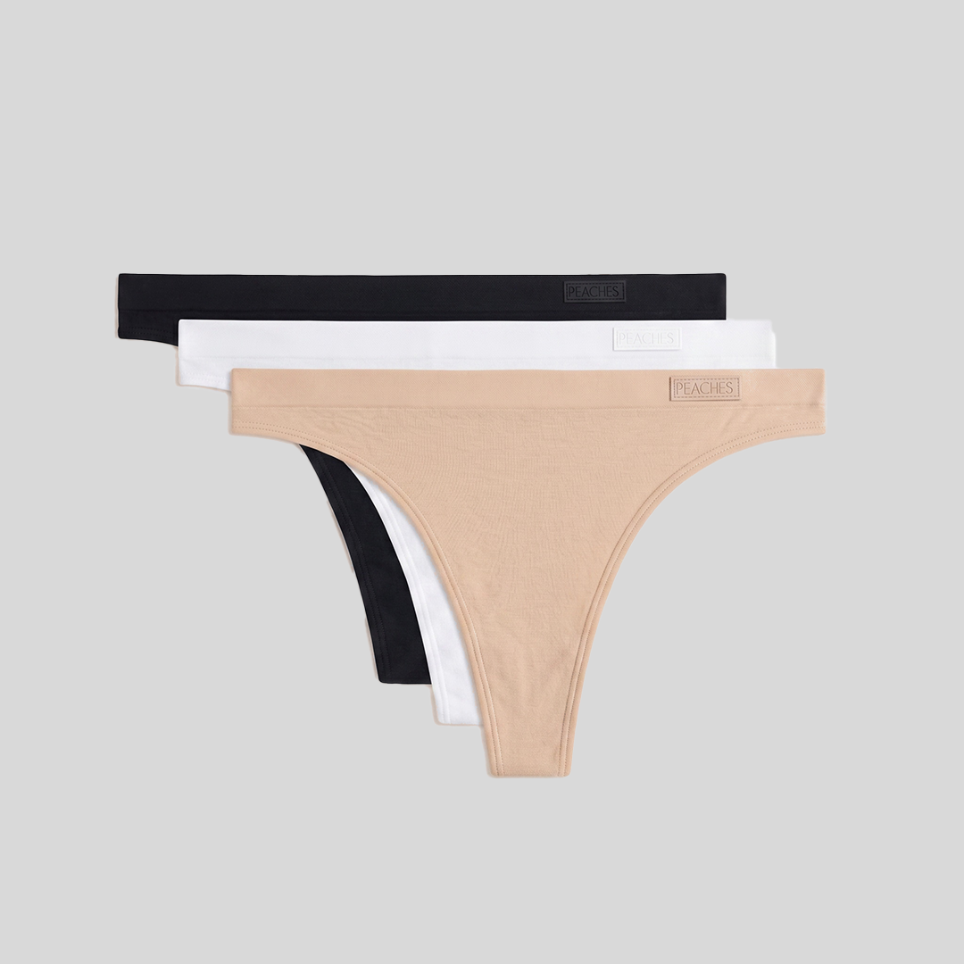 Peaches The Secret Trio Pack — seamless thong underwear set of 3 in beige, black and white