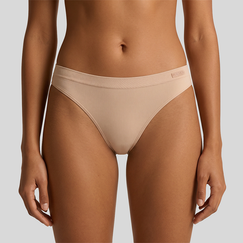 Peaches The Secret Trio Pack — seamless thong underwear worn by model, front view