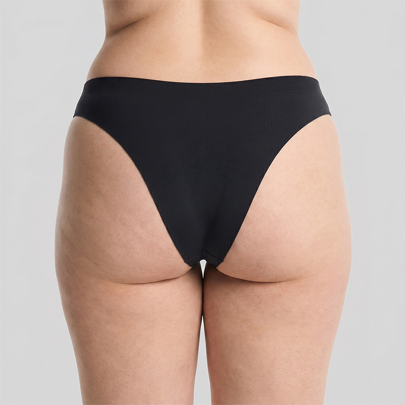 Peaches Brazilian underwear in black, back view on model
