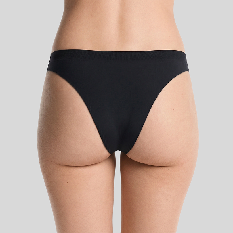 Peaches Brazilian underwear in black, back view on model