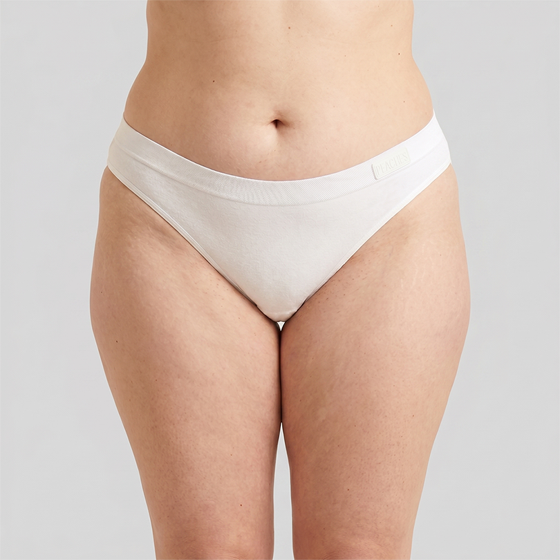 Peaches Brazilian underwear in white, front view on model